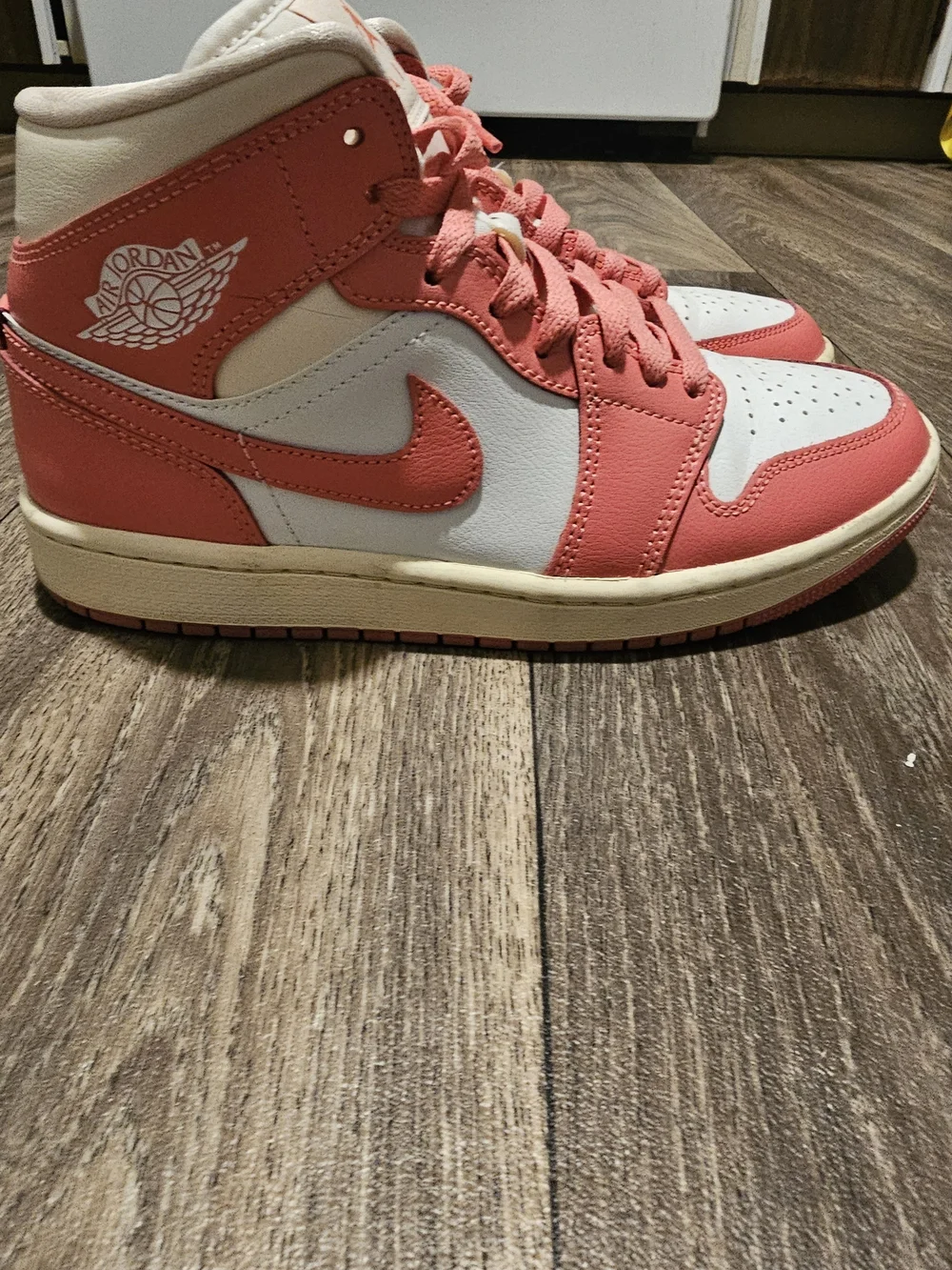 Jordan Women's High-Top Sneakers in Coral and Cream